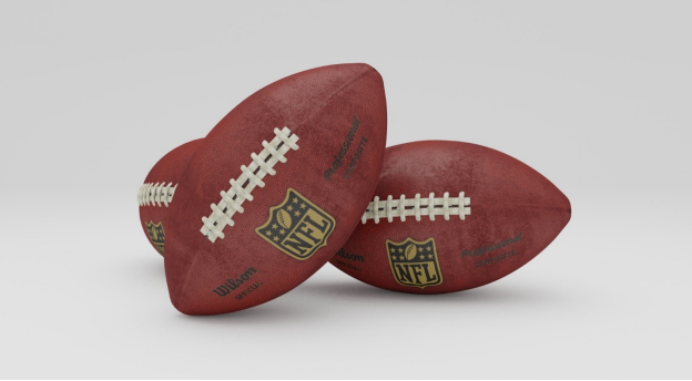 Three footballs next to each other
