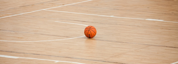 A basketball on an indoor court